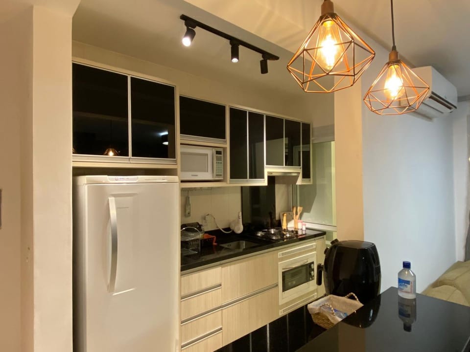 Kitchen or kitchenette, oven, stove