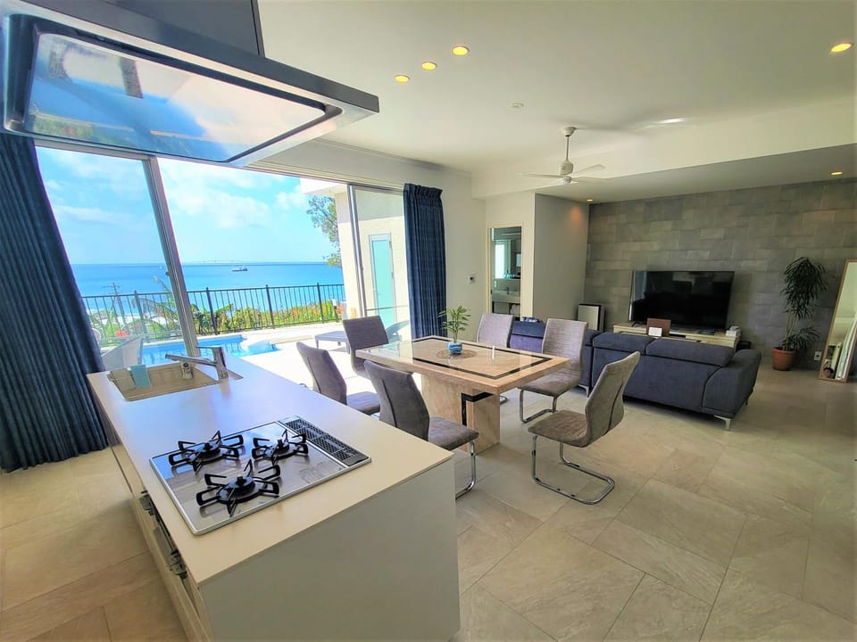 View (from property/room), Balcony/Terrace, Living room, Dining area, Pool view, Sea view, Swimming pool