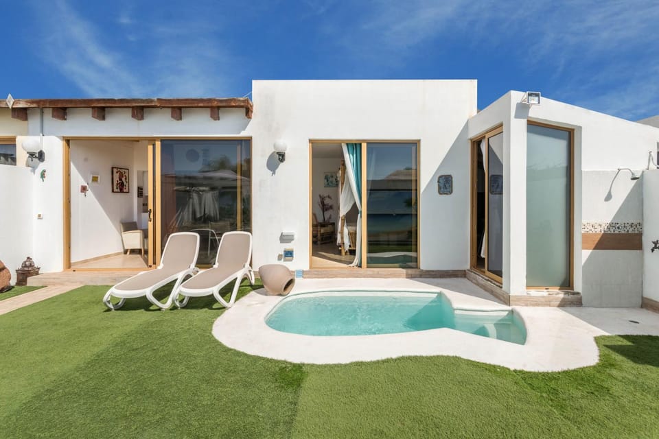 Property building, Living room, Swimming pool