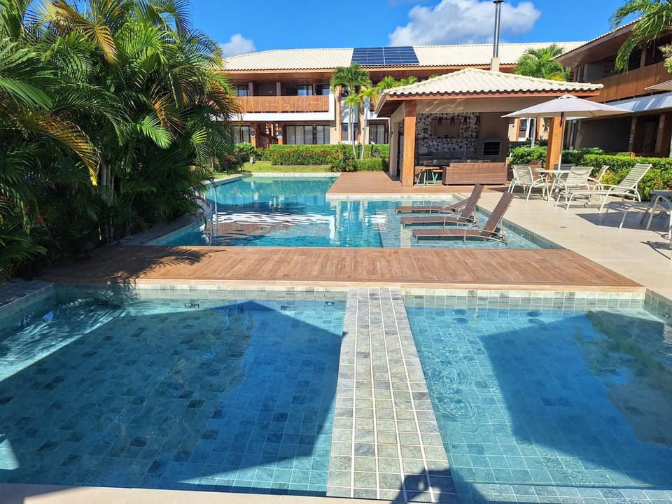 Communal lounge/ TV room, Hot Tub, Seating area, Swimming pool, sunbed