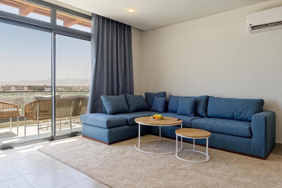 View (from property/room), Living room, Seating area, Dining area, air conditioner