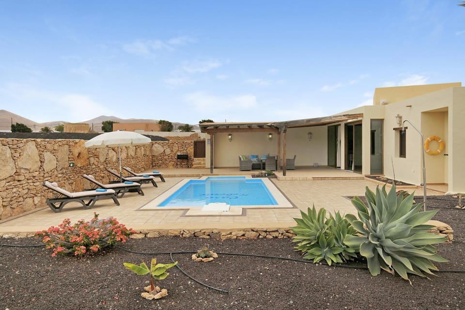 Property building, Living room, Swimming pool