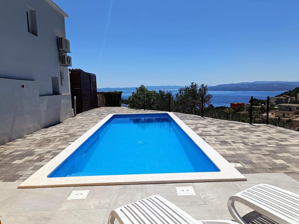 Patio, Day, Natural landscape, Pool view, Sea view, Swimming pool, sunbed