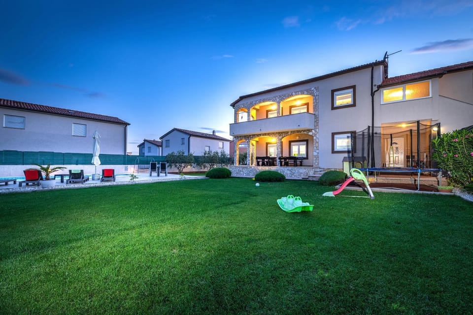 Property building, Children play ground, Garden, Swimming pool, Sunset