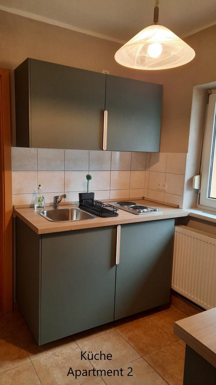 Kitchen or kitchenette, stove, kitchen