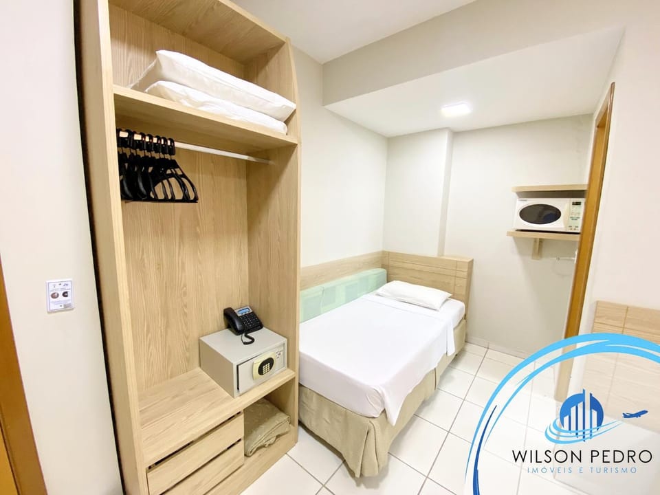 Bed, Photo of the whole room, Bedroom, microwave, wardrobe