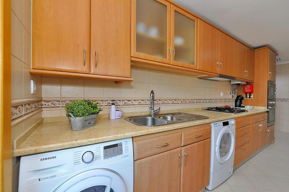 Communal kitchen, washing machine, dryer