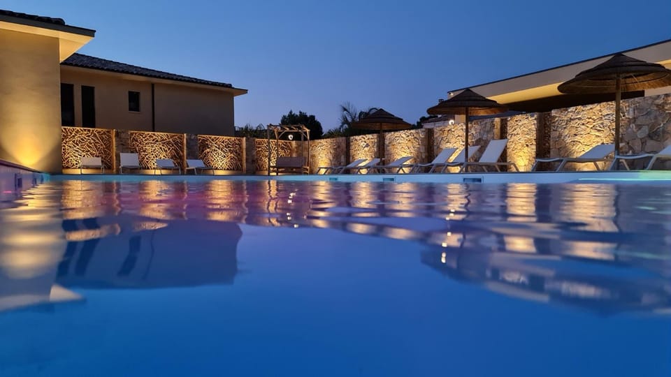 Property building, Night, Pool view, Swimming pool, sunbed