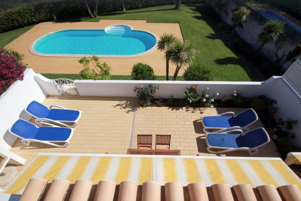 Property building, Living room, Swimming pool
