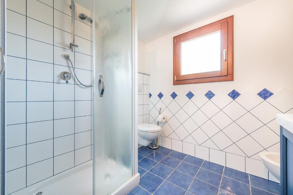 CASE I GINEPRI A e ATTICO House in Cala Gonone