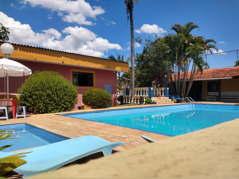 Property building, Patio, Game Room, Pool view, Swimming pool, sunbed
