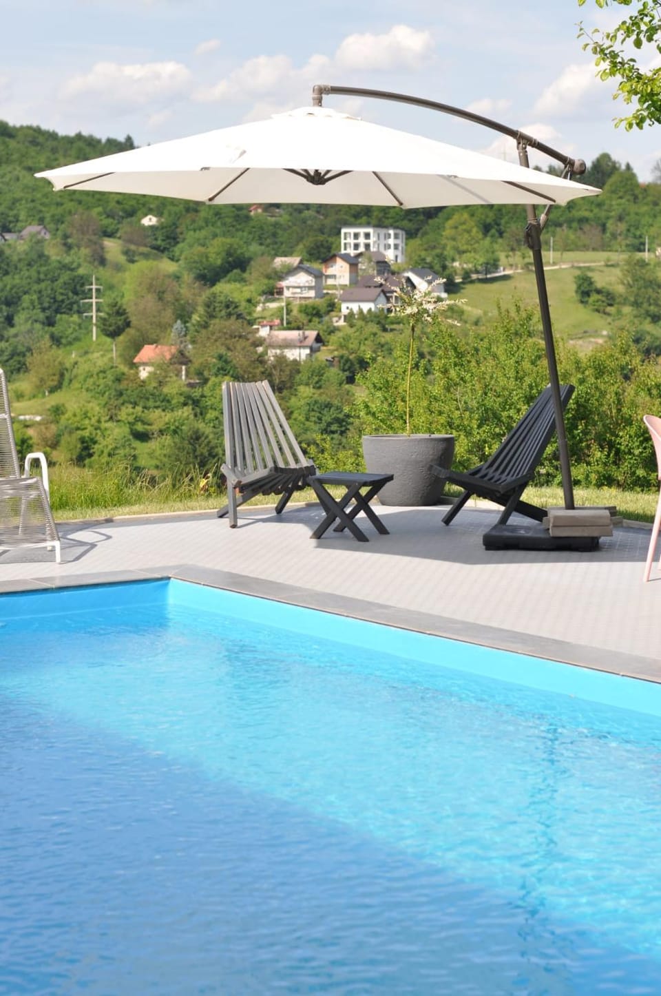 Swimming pool, sunbed