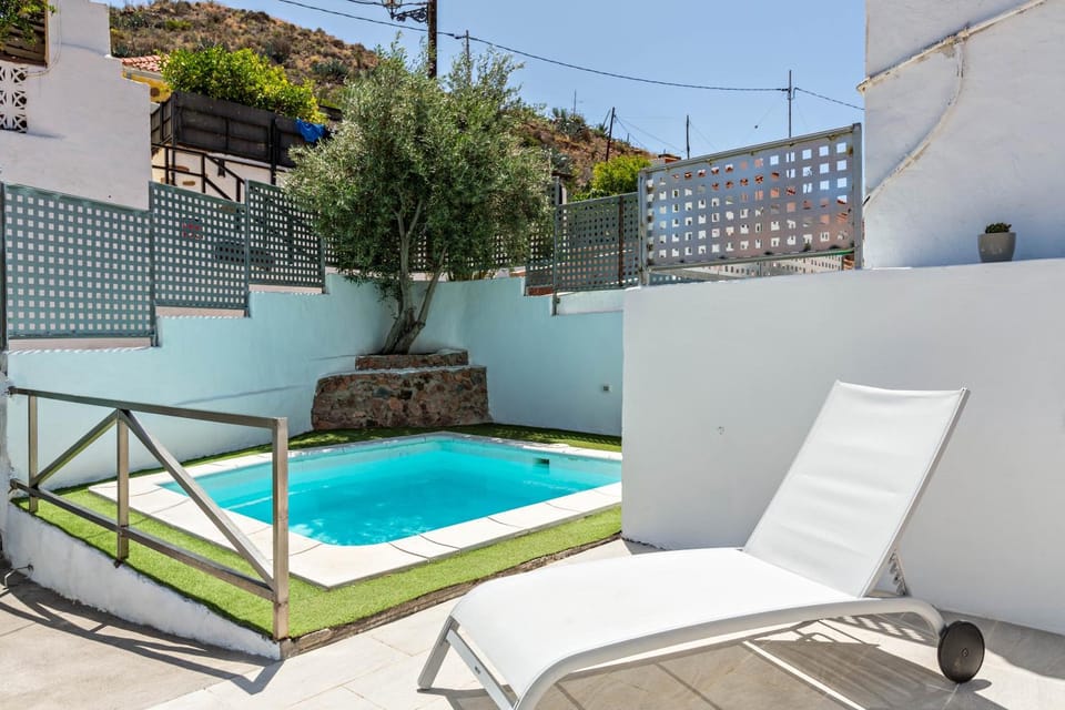 Property building, Living room, Swimming pool