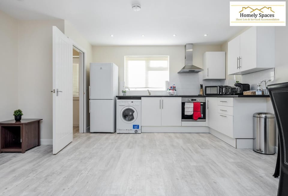 Kitchen or kitchenette, washing machine