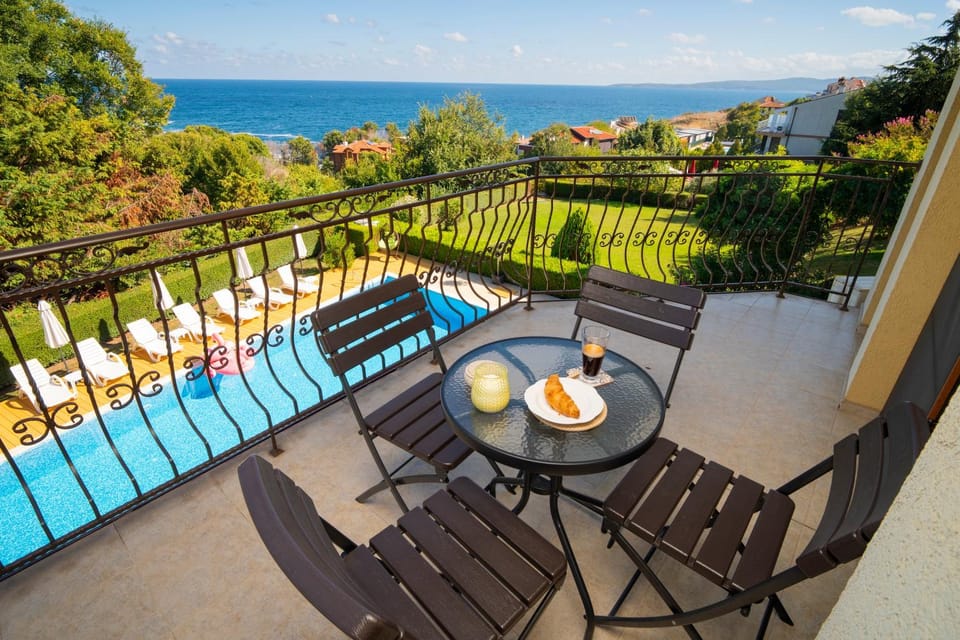 Patio, Day, Natural landscape, View (from property/room), Balcony/Terrace, Living room, Seating area, Dining area, Sea view, Swimming pool