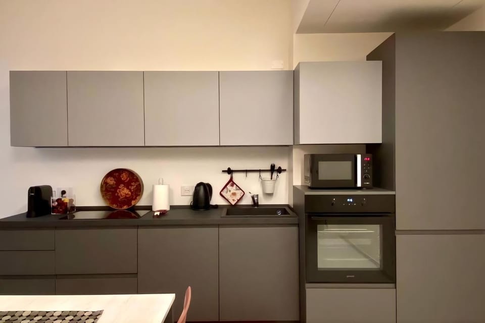 Kitchen or kitchenette, oven, stove