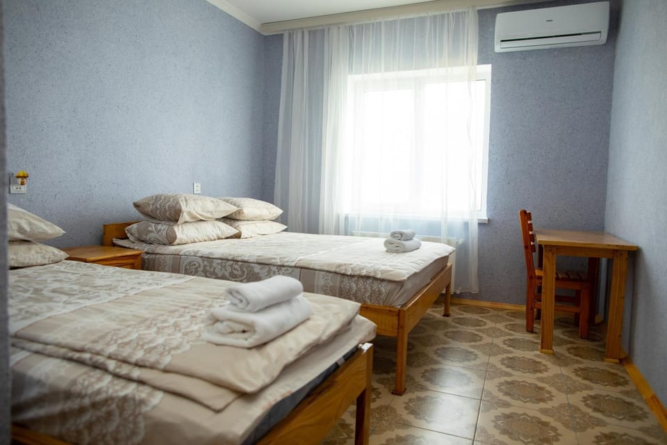 Bed, Photo of the whole room, Bedroom, towels, air conditioner
