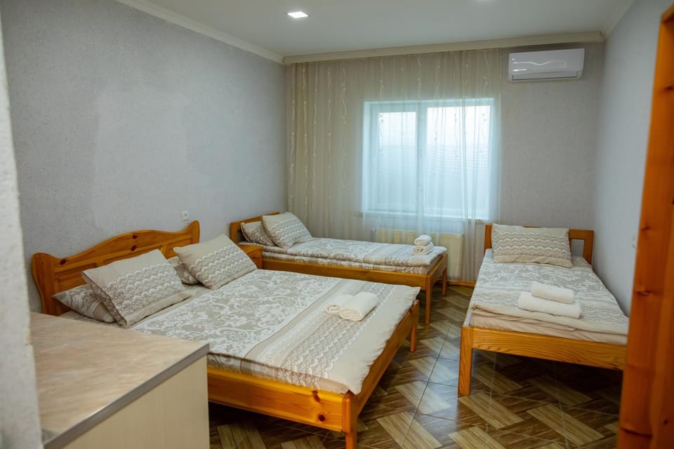Bed, Photo of the whole room, Bedroom, towels, air conditioner