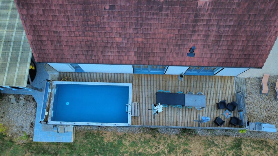 Property building, Patio, Pool view, Swimming pool, sunbed