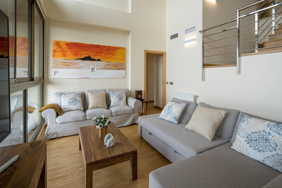 View (from property/room), Living room, Decorative detail, Seating area, City view, Mountain view