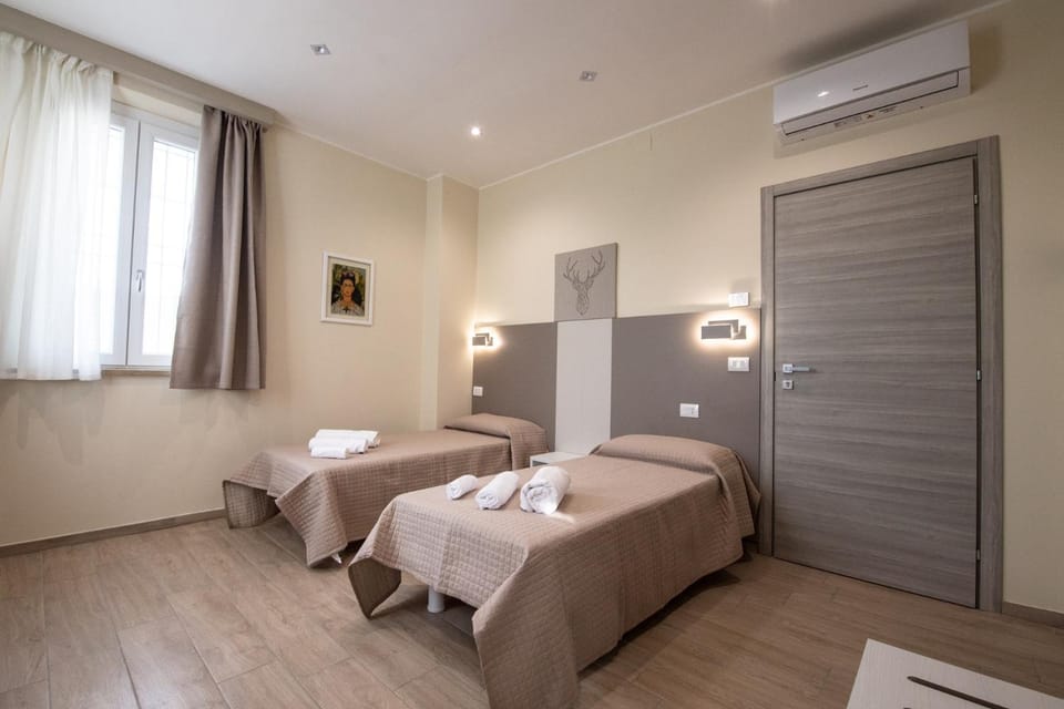 Bed, Photo of the whole room, Bedroom, towels, air conditioner