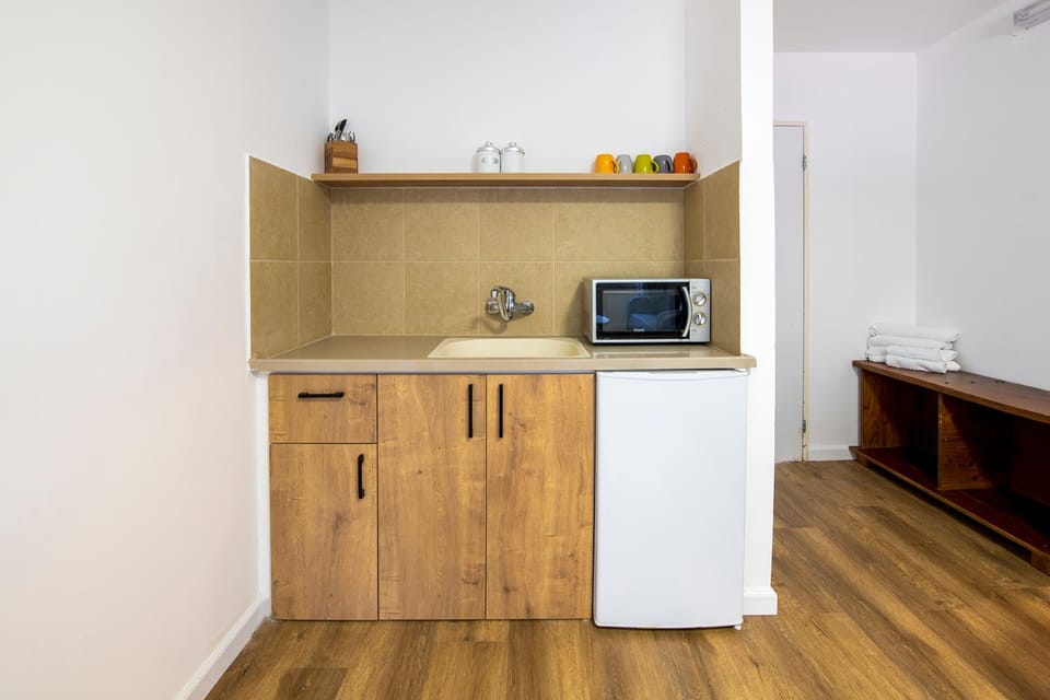 Kitchen or kitchenette, microwave