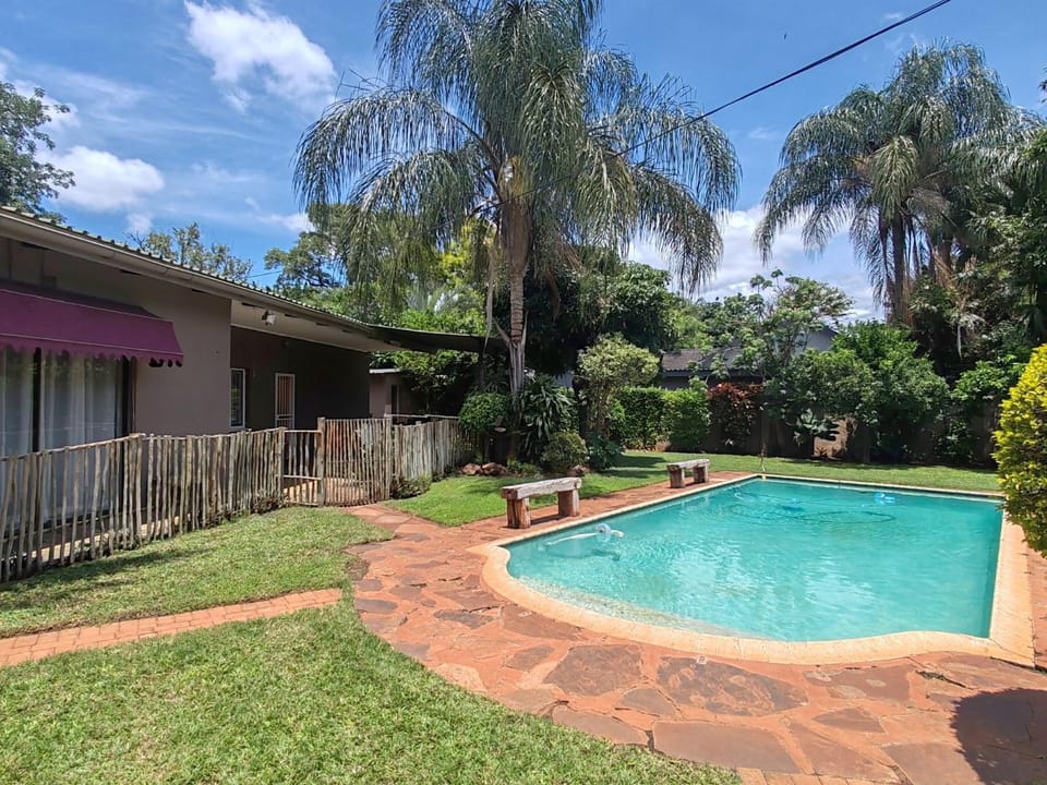 Property building, Patio, Garden, Garden view, Swimming pool