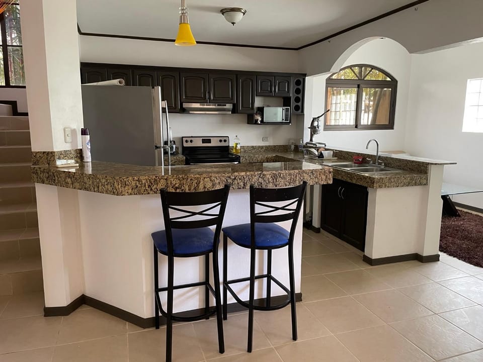 Family oriented house just steps to the beach House in Jaco