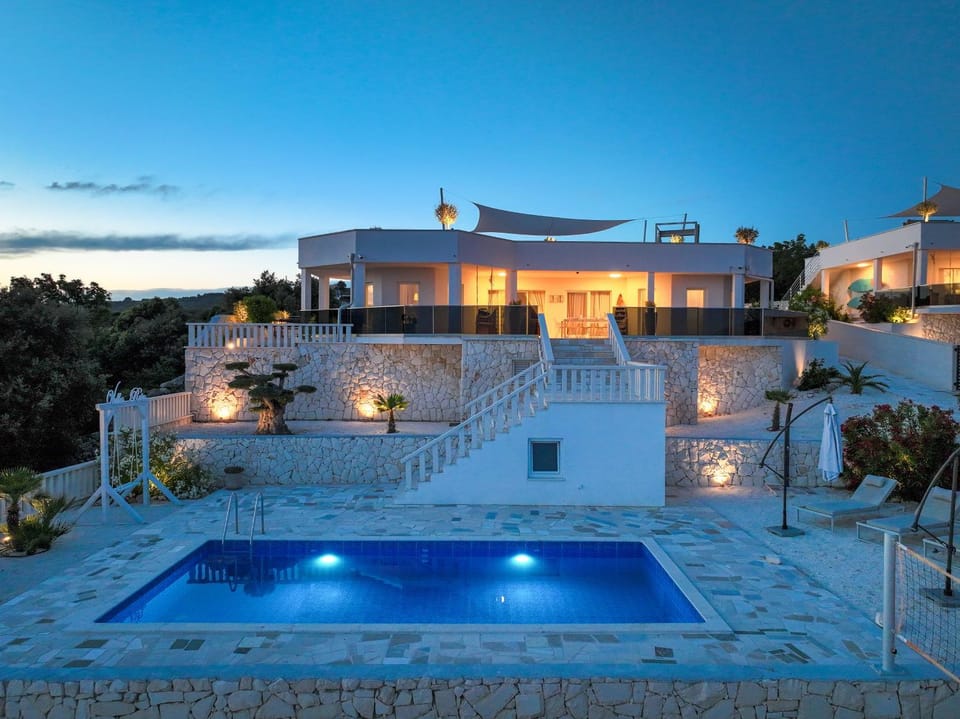 Property building, Night, Swimming pool