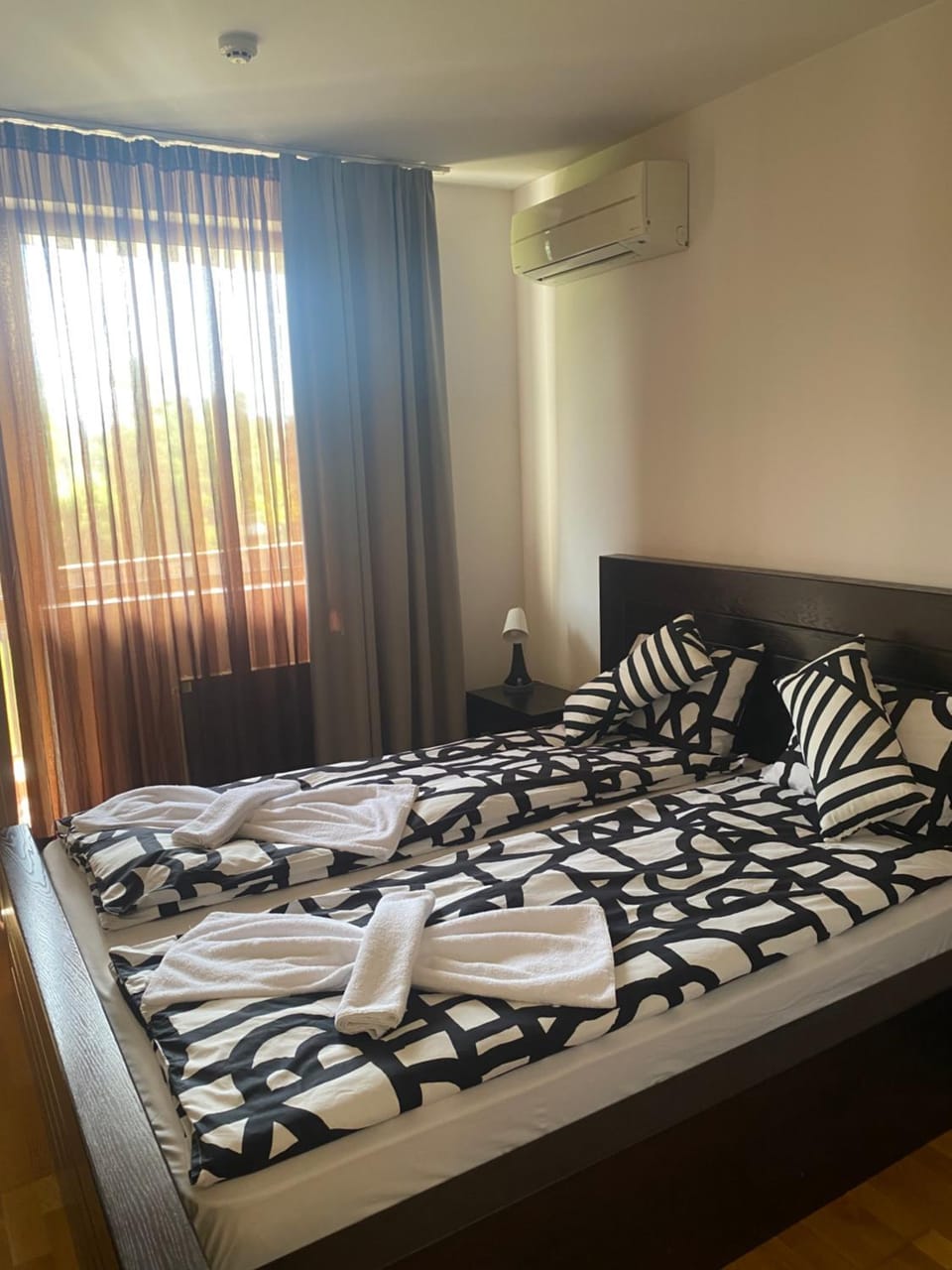 Bed, Photo of the whole room, Bedroom, towels, air conditioner