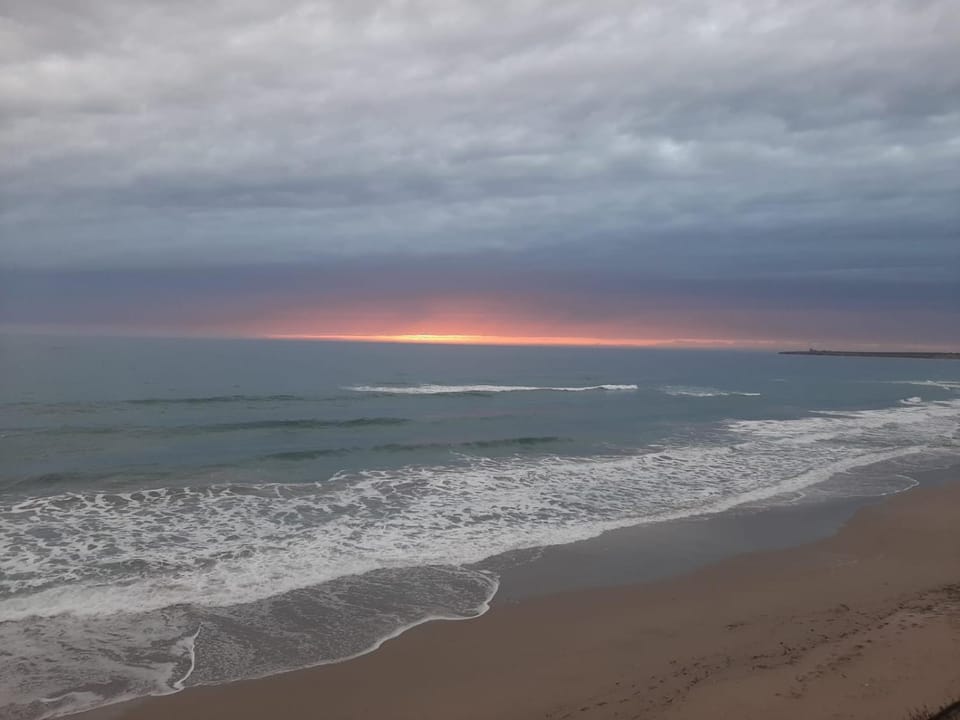 Property building, Natural landscape, Beach, Sea view, Sunset