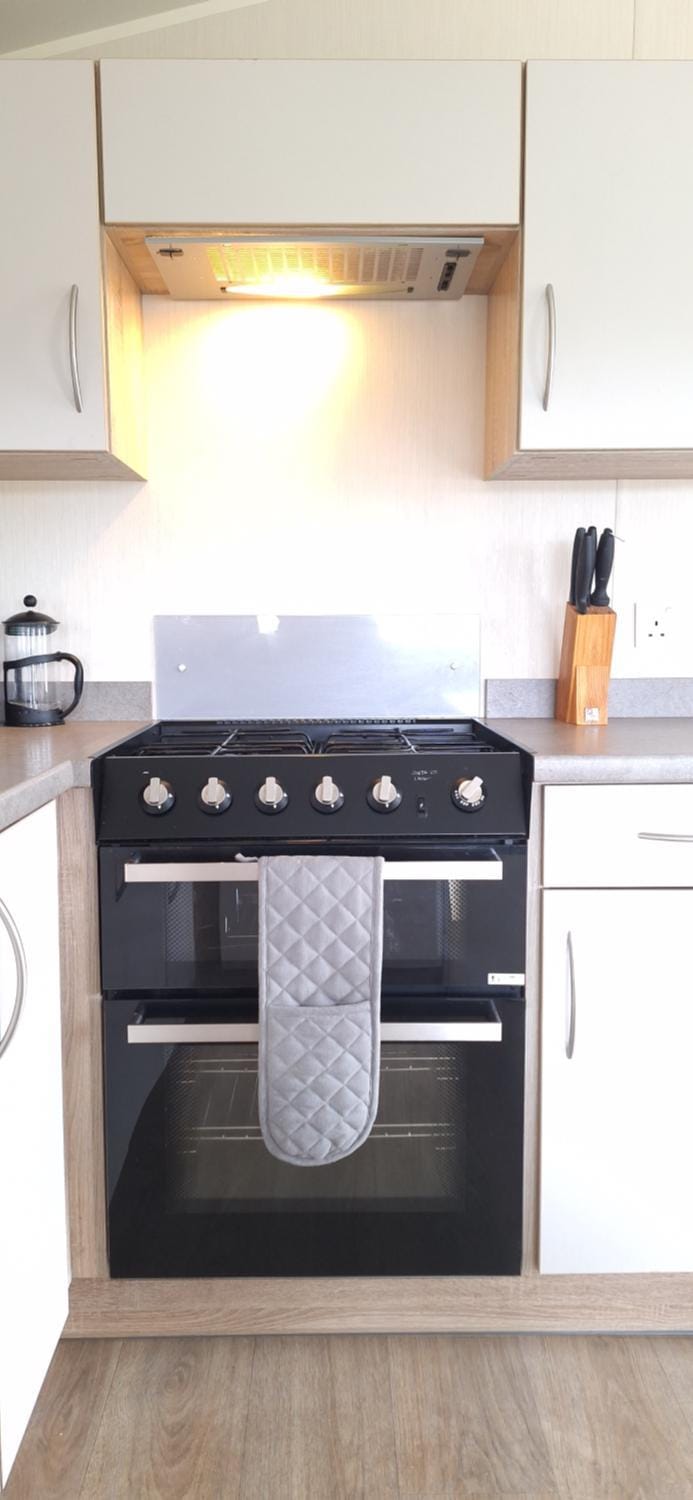Kitchen or kitchenette, stove