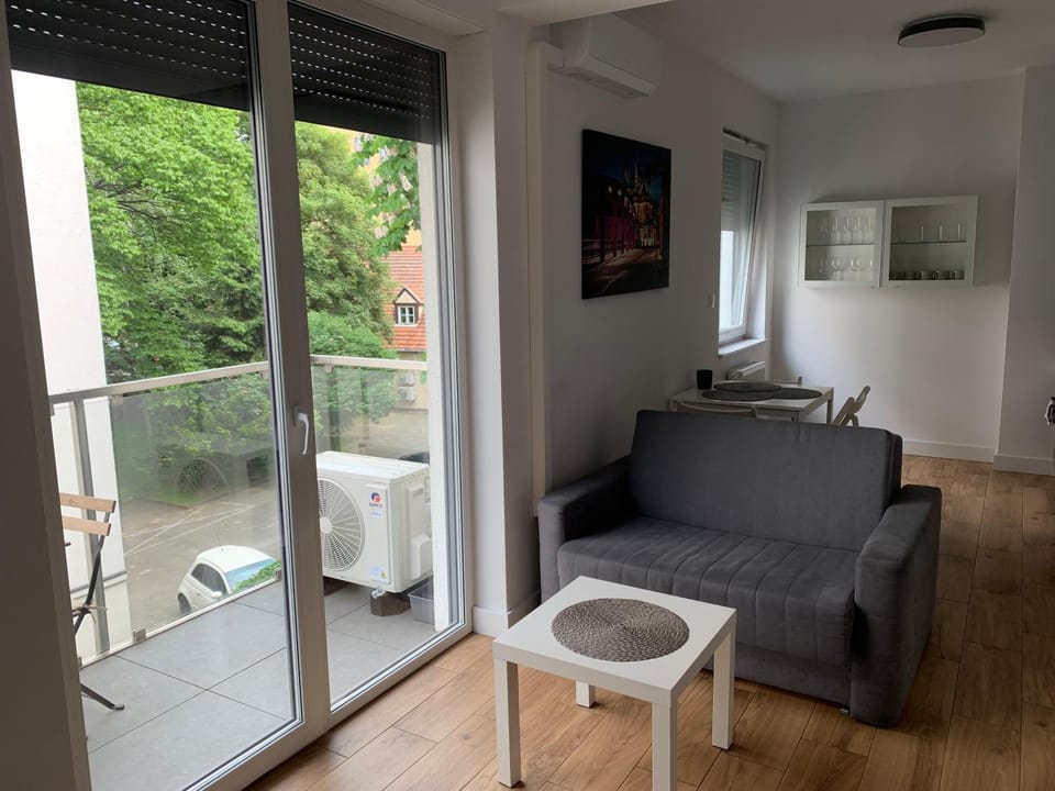 View (from property/room), Balcony/Terrace, Living room, Seating area, Dining area, air conditioner, air conditioner