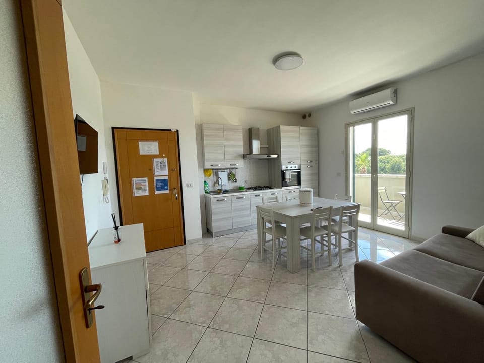 Kitchen or kitchenette, Living room, Seating area, Dining area, Sea view, oven, stove, air conditioner