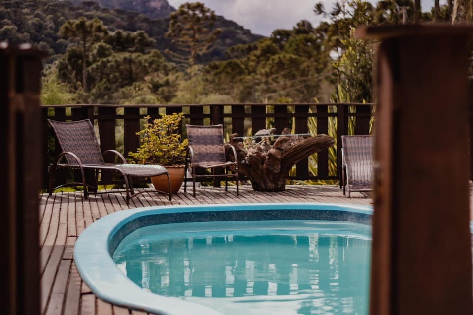 Chalés e Suítes Jardim do Buda com piscina aquecida Inn in State of Santa Catarina