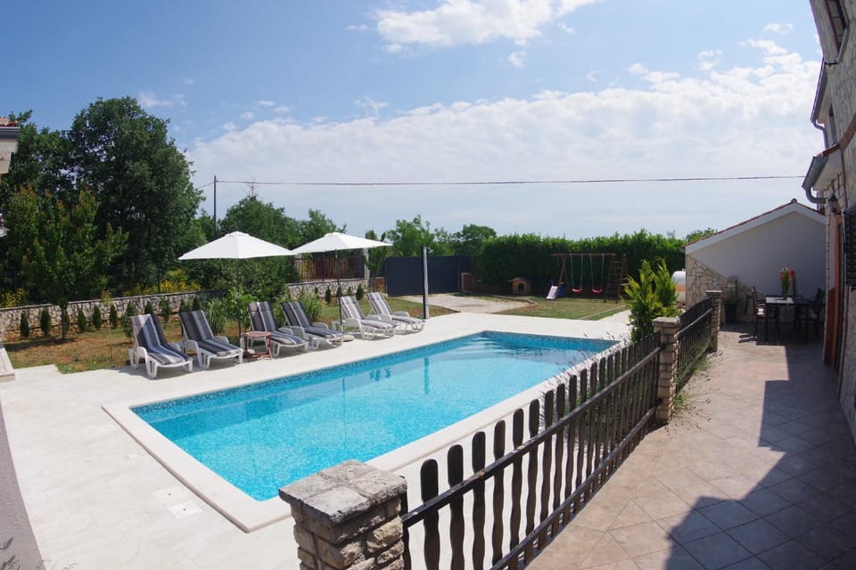 Swimming pool, sunbed