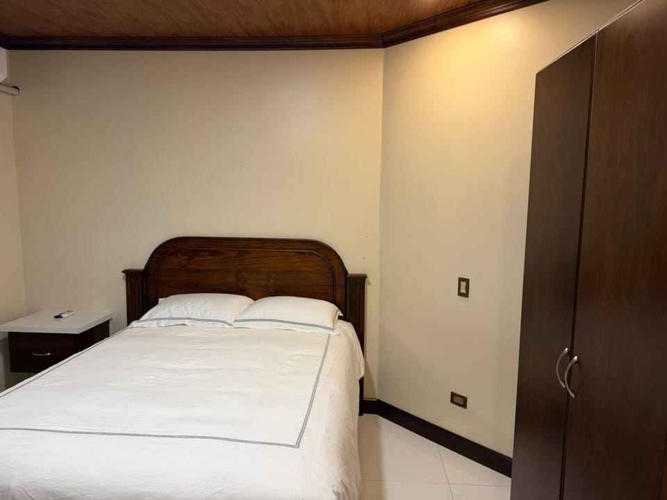 Bed, wardrobe
