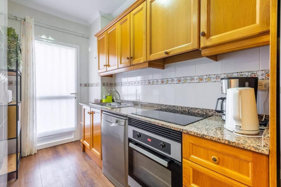 Kitchen or kitchenette, dishwasher, microwave, oven, stove, kitchen