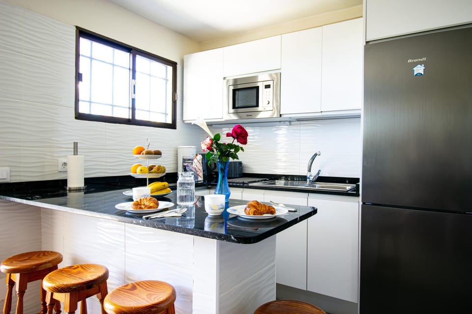 Kitchen or kitchenette, stove, kitchen