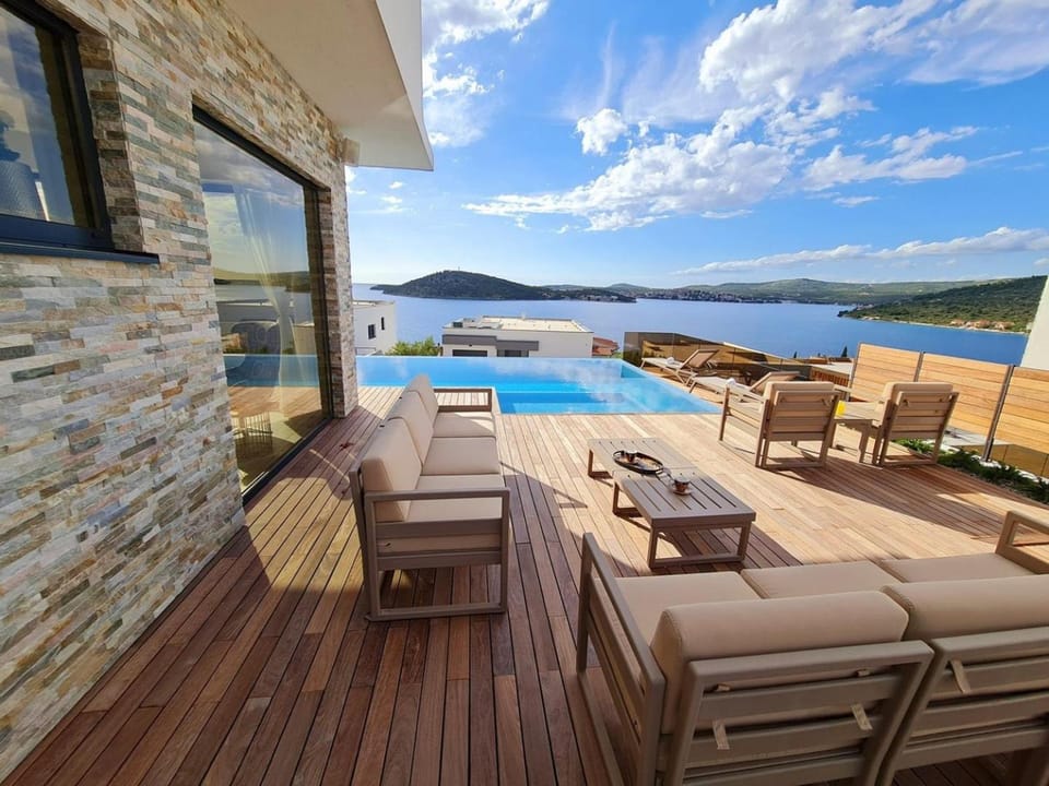 Seating area, Sea view, Swimming pool