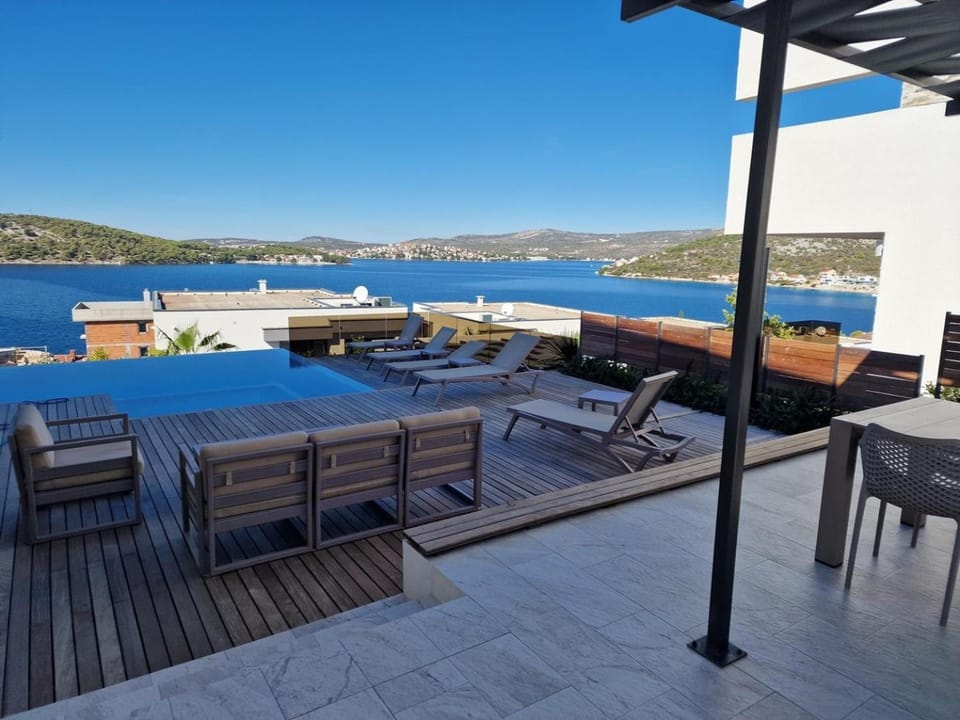 BBQ facilities, Bathroom, Seating area, Sea view, Swimming pool
