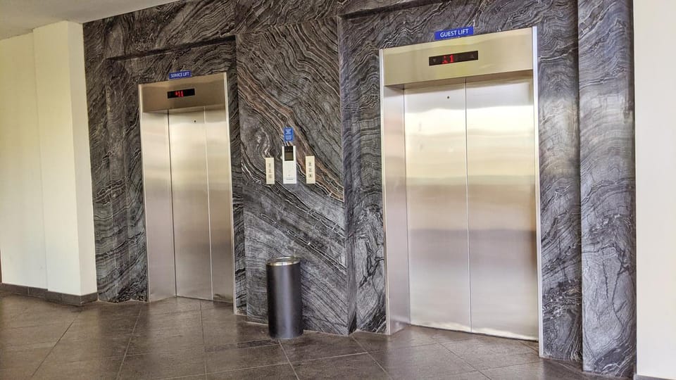 Property building, elevator
