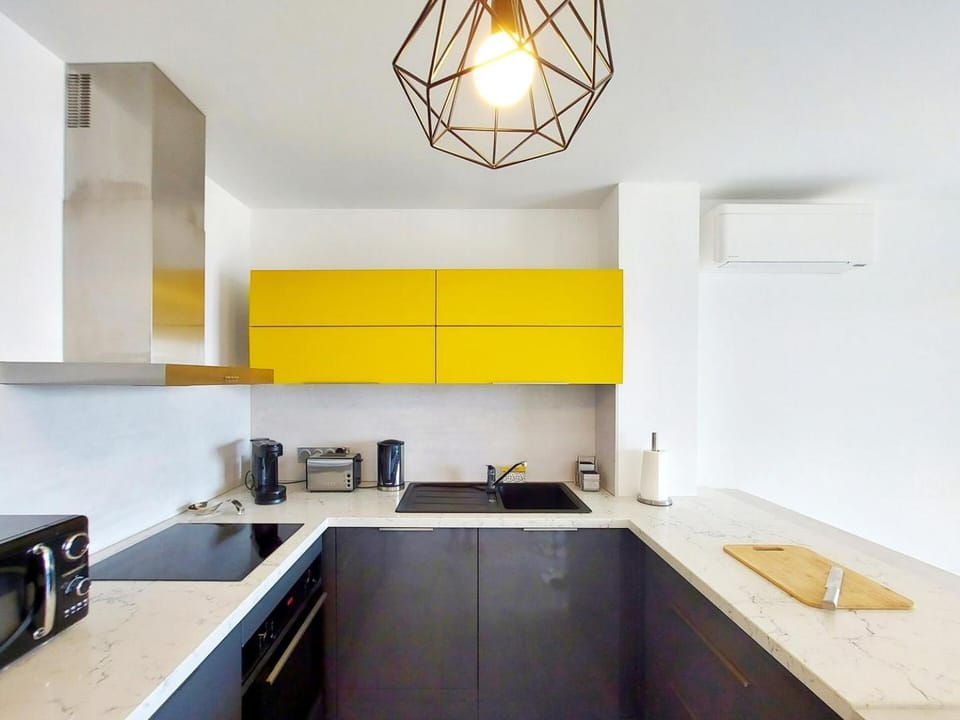 Kitchen or kitchenette, oven, stove, toaster