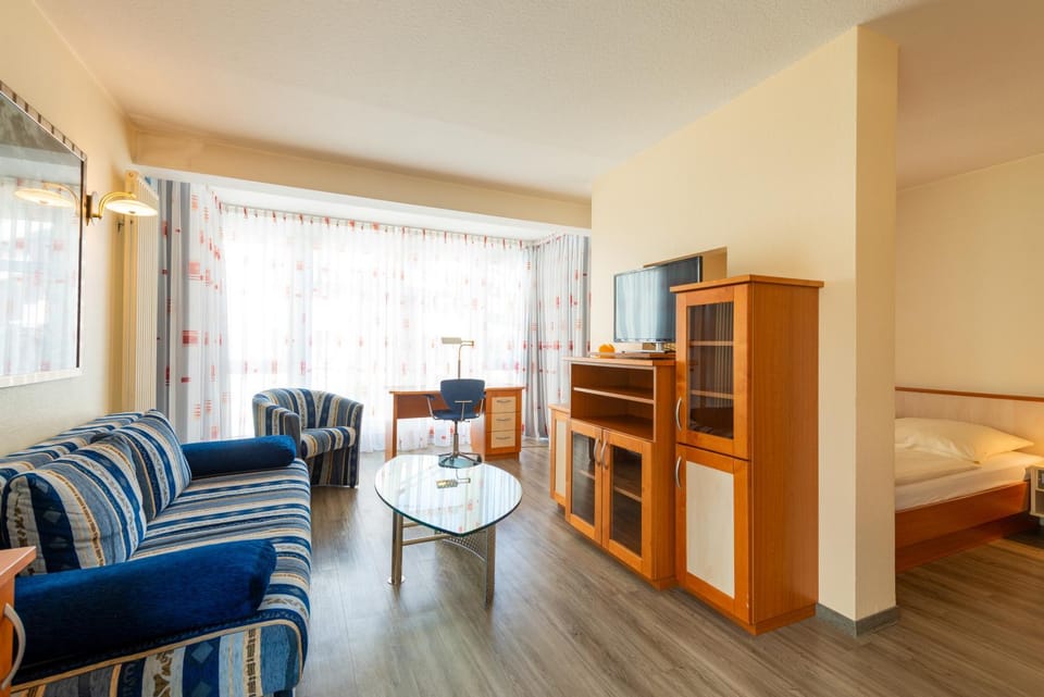 Bed, Living room, Seating area