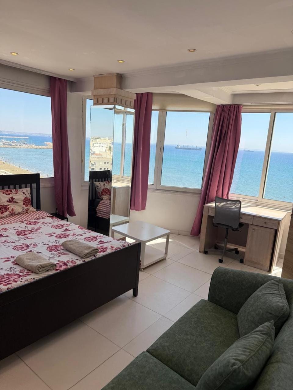 Bed, Natural landscape, Seating area, Bedroom, Sea view