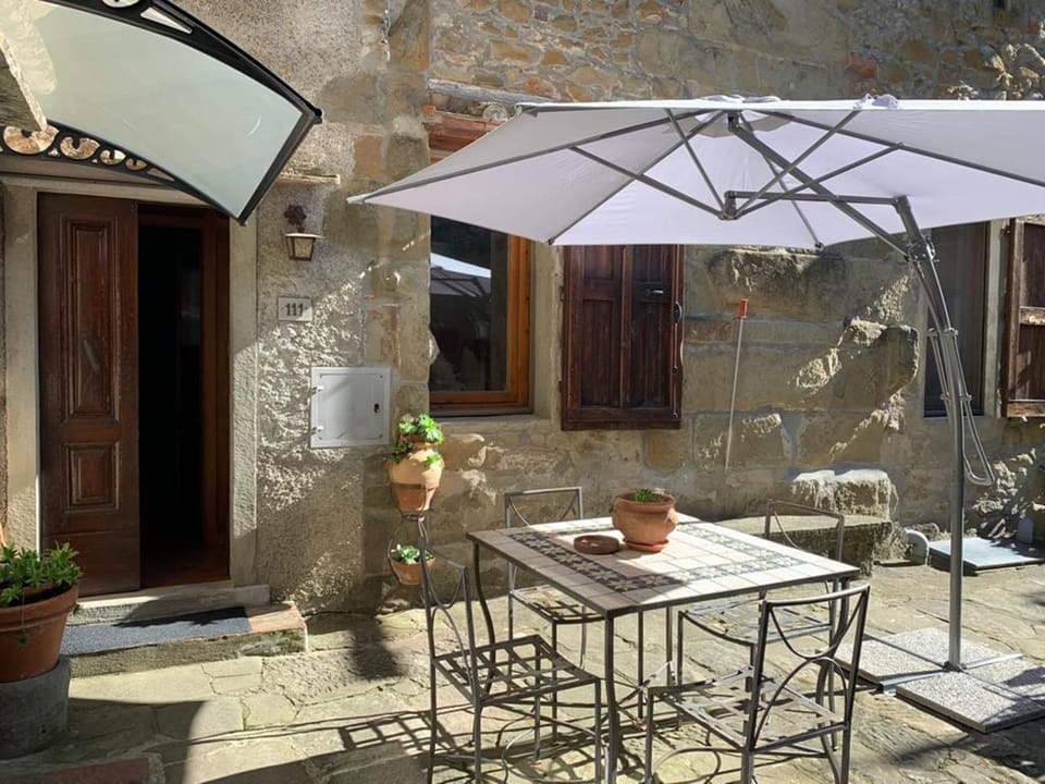 Property building, Patio, Facade/entrance, View (from property/room), Dining area, Inner courtyard view