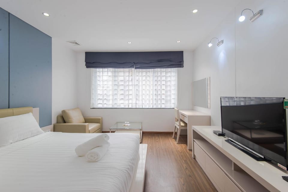 Communal lounge/ TV room, Bed, TV and multimedia, Living room, Photo of the whole room, Seating area, Bedroom, hair dresser, air conditioner