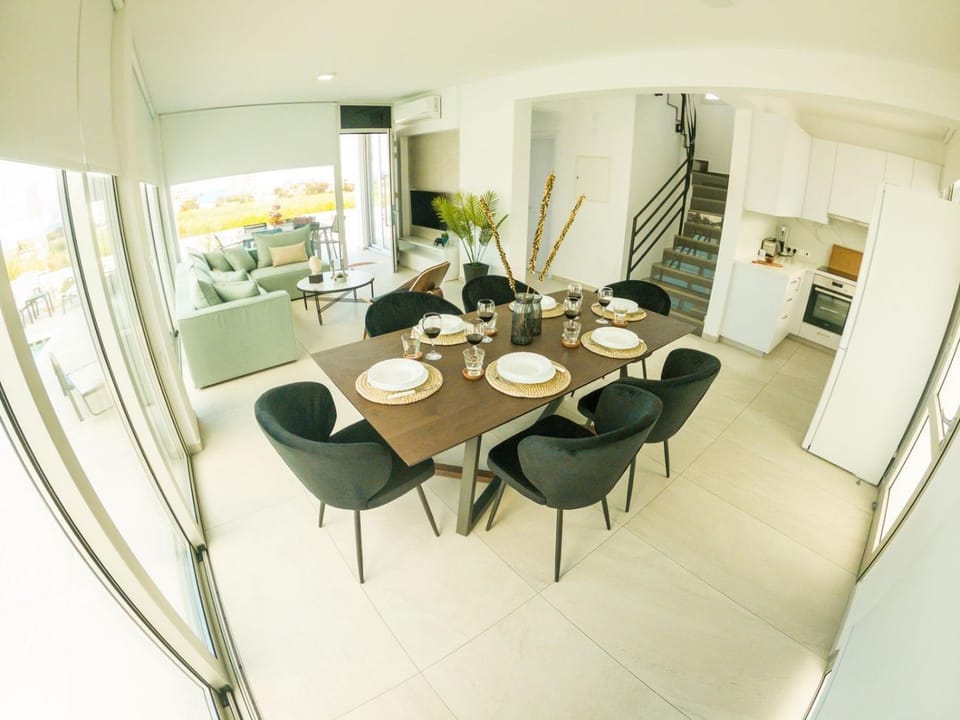 Kitchen or kitchenette, Living room, Dining area, Pool view