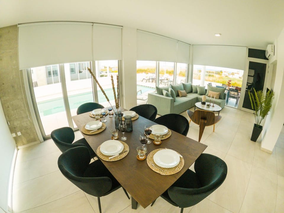 Living room, Dining area, Pool view