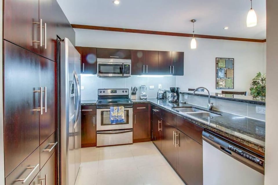 Kitchen or kitchenette, dishwasher, oven, stove, toaster